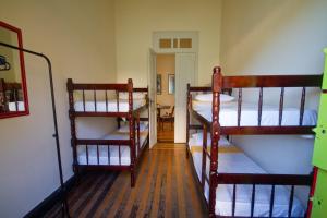 Cama ou camas em um quarto em Guanaaní Hostel