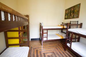 Cama ou camas em um quarto em Guanaaní Hostel