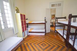 Cama ou camas em um quarto em Guanaaní Hostel