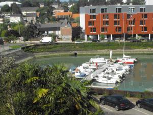 a bunch of boats are docked in a marina at Résidence ALEXIA in Saint-Valéry-en-Caux