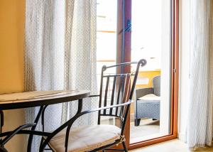 Letto o letti in una camera di B&B I Gerani