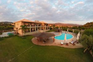 an aerial view of a hotel with a swimming pool at Tsokas Hotel in Finikounta