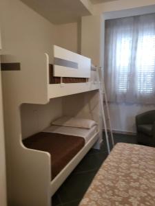 Posteľ alebo postele v izbe v ubytovaní Casa vacanza lifra 2