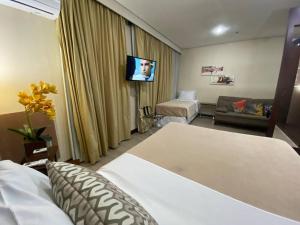 Cama ou camas em um quarto em Nips 502 - Flat Executivo Zona Sul SP