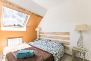 Postel nebo postele na pokoji v ubytování Le jardin des fées