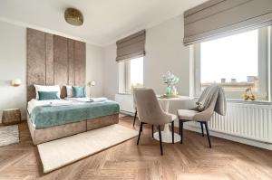 Posteľ alebo postele v izbe v ubytovaní MARGI Daphne LUX BEAUTI STUDIO