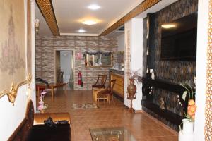 a hallway of a home with a stone wall at Pension La Lambra Azul in Alicante +35 photos