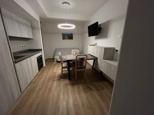 Kuchyň nebo kuchyňský kout v ubytování Hotel Dolomiti
