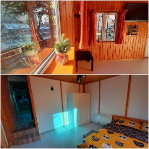 um quarto com uma cama e uma janela em Casuta dintre brazi - Valea Doftanei - 2 camere em Valea Doftanei