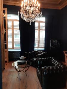 A seating area at Sint Andries Suites