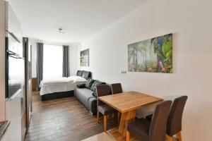Posteľ alebo postele v izbe v ubytovaní Apartmány Na Náměstí 85