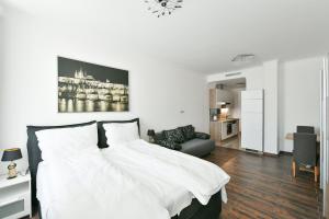 Posteľ alebo postele v izbe v ubytovaní Apartmány Na Náměstí 85