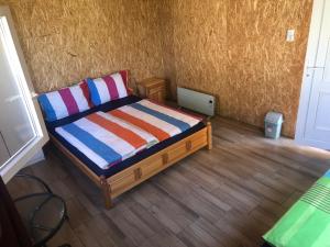 Postel nebo postele na pokoji v ubytování Tóparti Camping