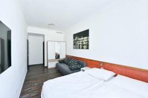 Posteľ alebo postele v izbe v ubytovaní Apartmány Na Náměstí 85