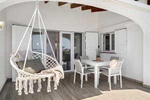 Patio lub wspólna przestrzeń na świeżym powietrzu w obiekcie Apartamento Buganvilla