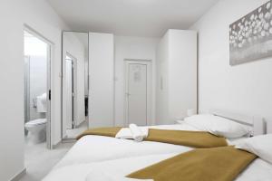 Cama o camas de una habitación en Rooms Studentsko Naselje Ivan Goran Kovačić
