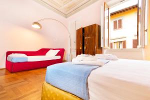 Postel nebo postele na pokoji v ubytování Hotel la Scala
