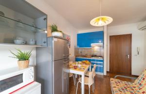 Kuchyň nebo kuchyňský kout v ubytování Residenza Acapulco