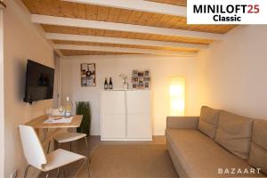 A television and/or entertainment centre at MiniLoft25