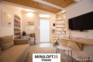 TV a/nebo společenská místnost v ubytování MiniLoft25