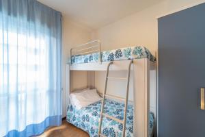 Postel nebo postele na pokoji v ubytování Residenza Acapulco + 22 fotografií