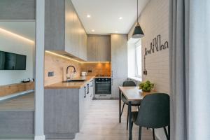 Kuhinja oz. manjša kuhinja v nastanitvi Klaipda Gate Apartments