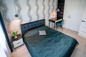 Krevet ili kreveti u jedinici u okviru objekta Klaipda Gate Apartments