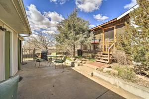 a patio with a table and chairs and a grill at Eco-Friendly Escape in Cortez - Pets are Welcome! in Cortez