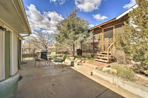 a patio with a table and chairs and a grill at Eco-Friendly Escape in Cortez - Pets Welcome! in Cortez