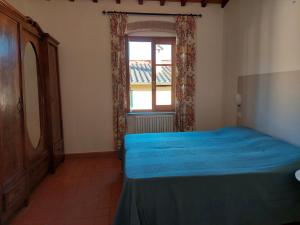 Postel nebo postele na pokoji v ubytování CASA PARTINGOLI