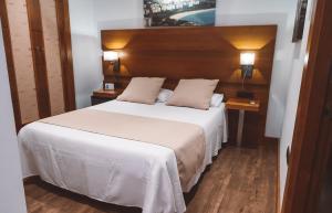 Postel nebo postele na pokoji v ubytování Ferreira Hostal Boutique