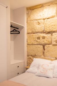 Postel nebo postele na pokoji v ubytování Nabrisa apartamento moderno en pleno centro con opción a parking