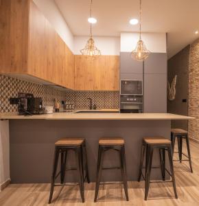 Kuchyň nebo kuchyňský kout v ubytování Nabrisa apartamento moderno en pleno centro con opción a parking