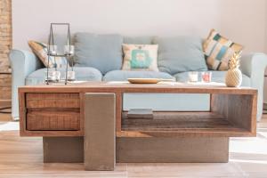 Posezení v ubytování Nabrisa apartamento moderno en pleno centro con opción a parking