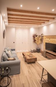 Posezení v ubytování Nabrisa apartamento moderno en pleno centro con opción a parking