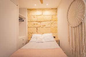 Postel nebo postele na pokoji v ubytování Nabrisa apartamento moderno en pleno centro con opción a parking