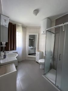 Kúpeľňa v ubytovaní Villa ARINA