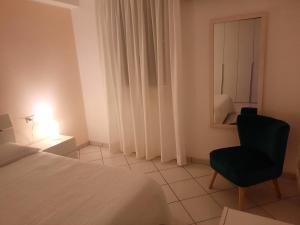Cama ou camas em um quarto em Villa Oblò