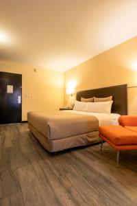 Postel nebo postele na pokoji v ubytování Hotel Rocaval San Cristóbal de las Casas