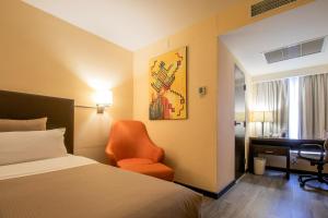 Postel nebo postele na pokoji v ubytování Hotel Rocaval San Cristóbal de las Casas