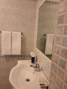 Um banheiro em Villa Oblò