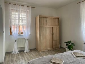 Postel nebo postele na pokoji v ubytování Apartmán Šimon
