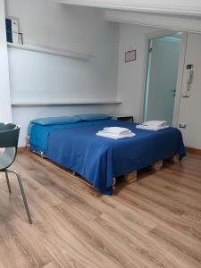 Katil atau katil-katil dalam bilik di Loft Porto Sant'Elpidio