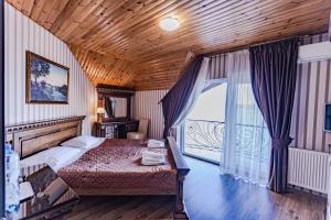Postel nebo postele na pokoji v ubytování Guest House Villa Lamperti