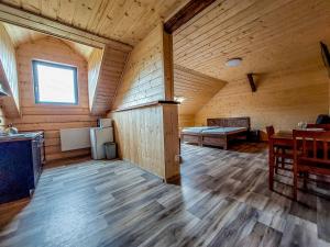 Posteľ alebo postele v izbe v ubytovaní Apartmány Kraš