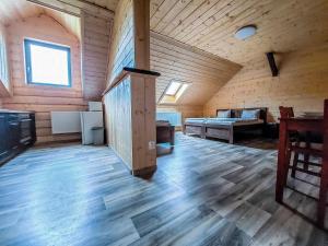 Posteľ alebo postele v izbe v ubytovaní Apartmány Kraš