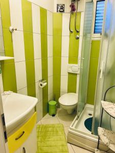 Koupelna v ubytování Apartmani Paula