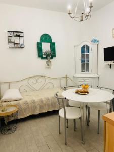 TV a/nebo společenská místnost v ubytování Apartmani Paula