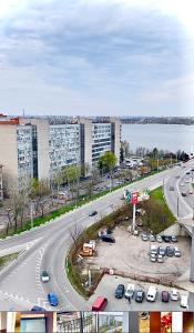 an overhead view of a highway with buildings and cars at Мост Сити 7 поверх in Dnipro