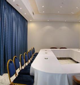 The business area and/or conference room at Ariha Hotel